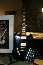 Design mock-up of the "Ax-Cellerate," guitar with built-in touch screen.